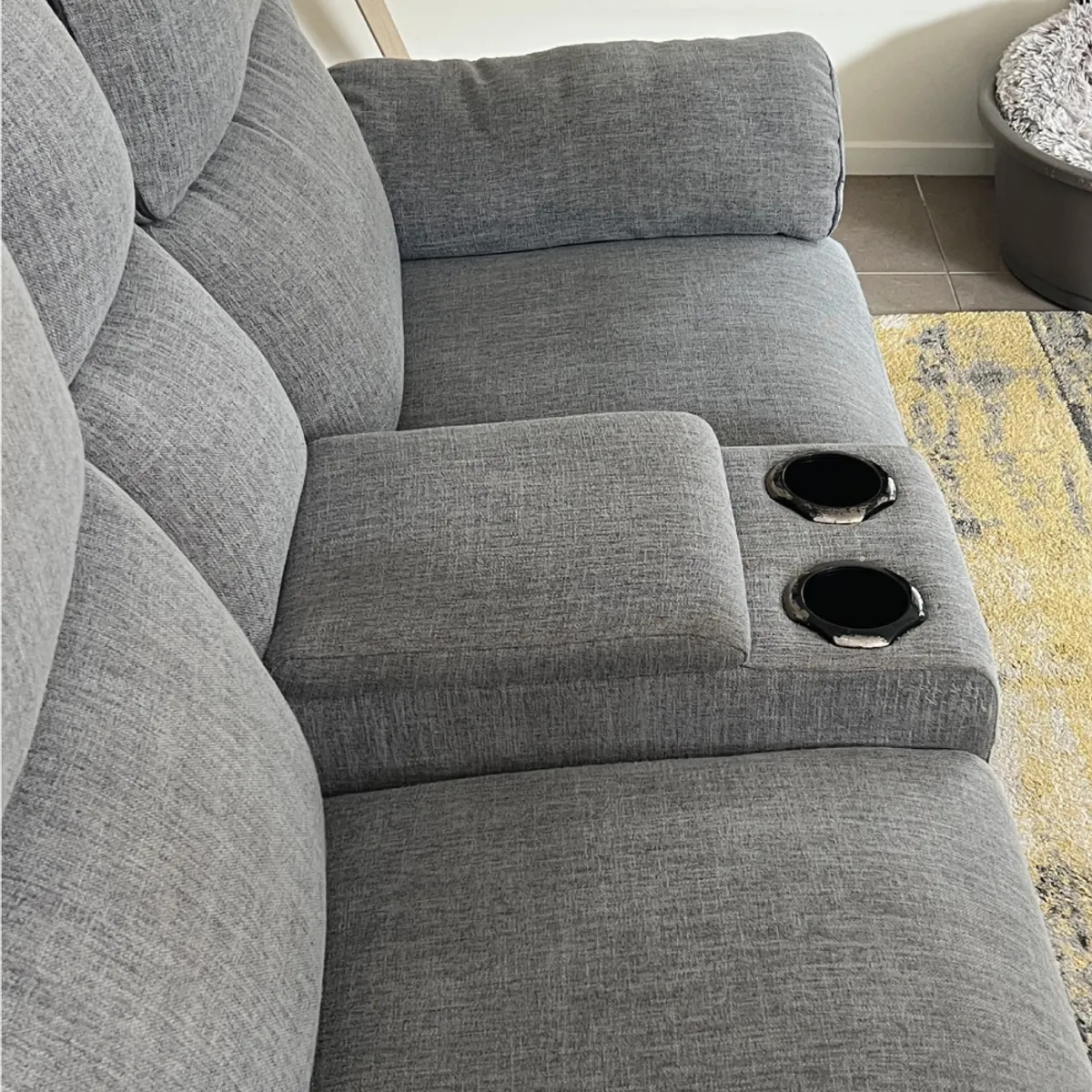 Green Lion technician deep cleaning a fabric lounge suite in a Point Cook living room
