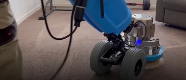 Low-moisture dry carpet cleaning machine refreshing office carpet in Melbourne