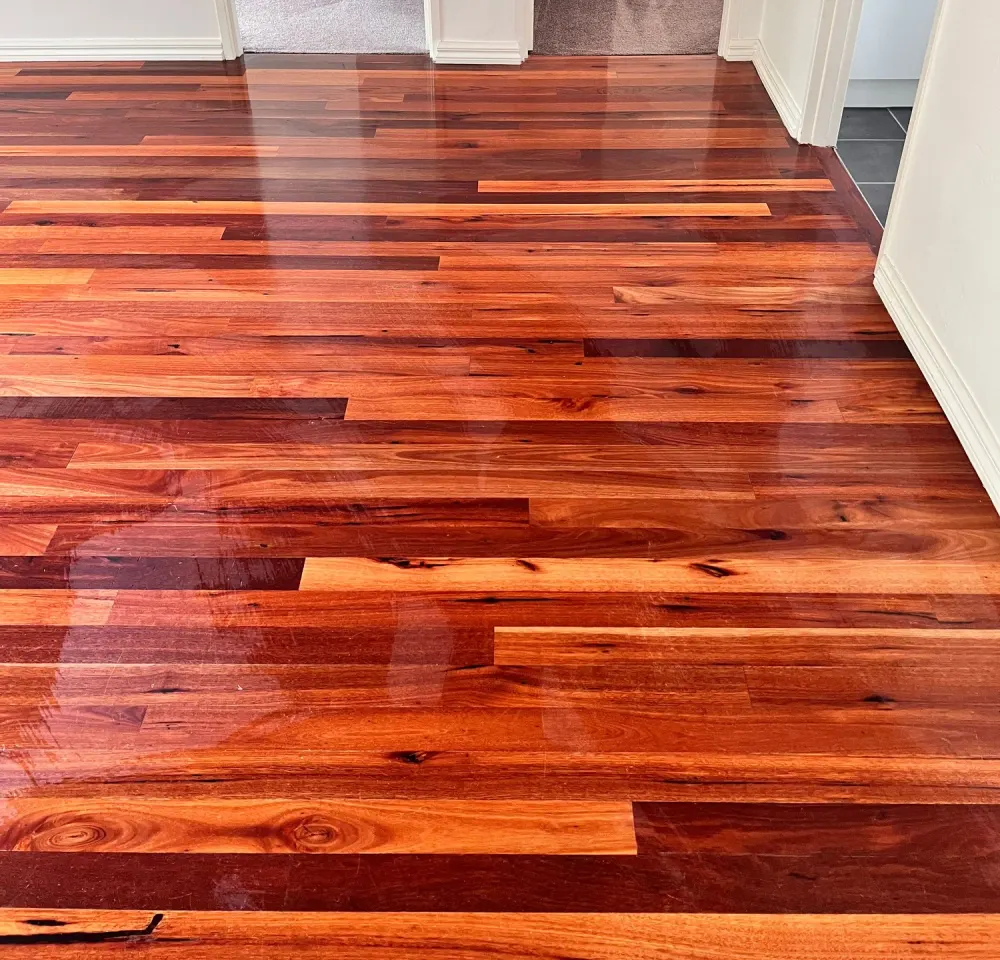 Timber hard floor being professionally cleaned to a streak-free finish in Point Cook